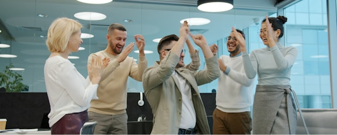 startup team celebrating successful launch